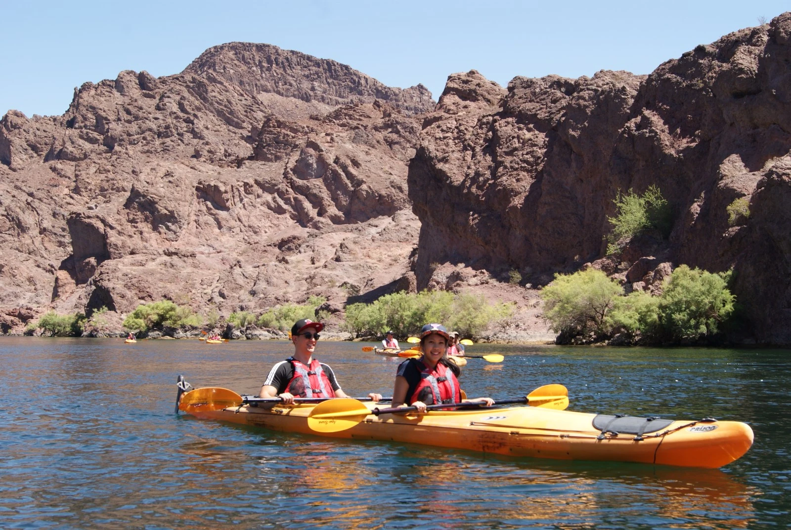 Kayakers paddling through Black Canyon