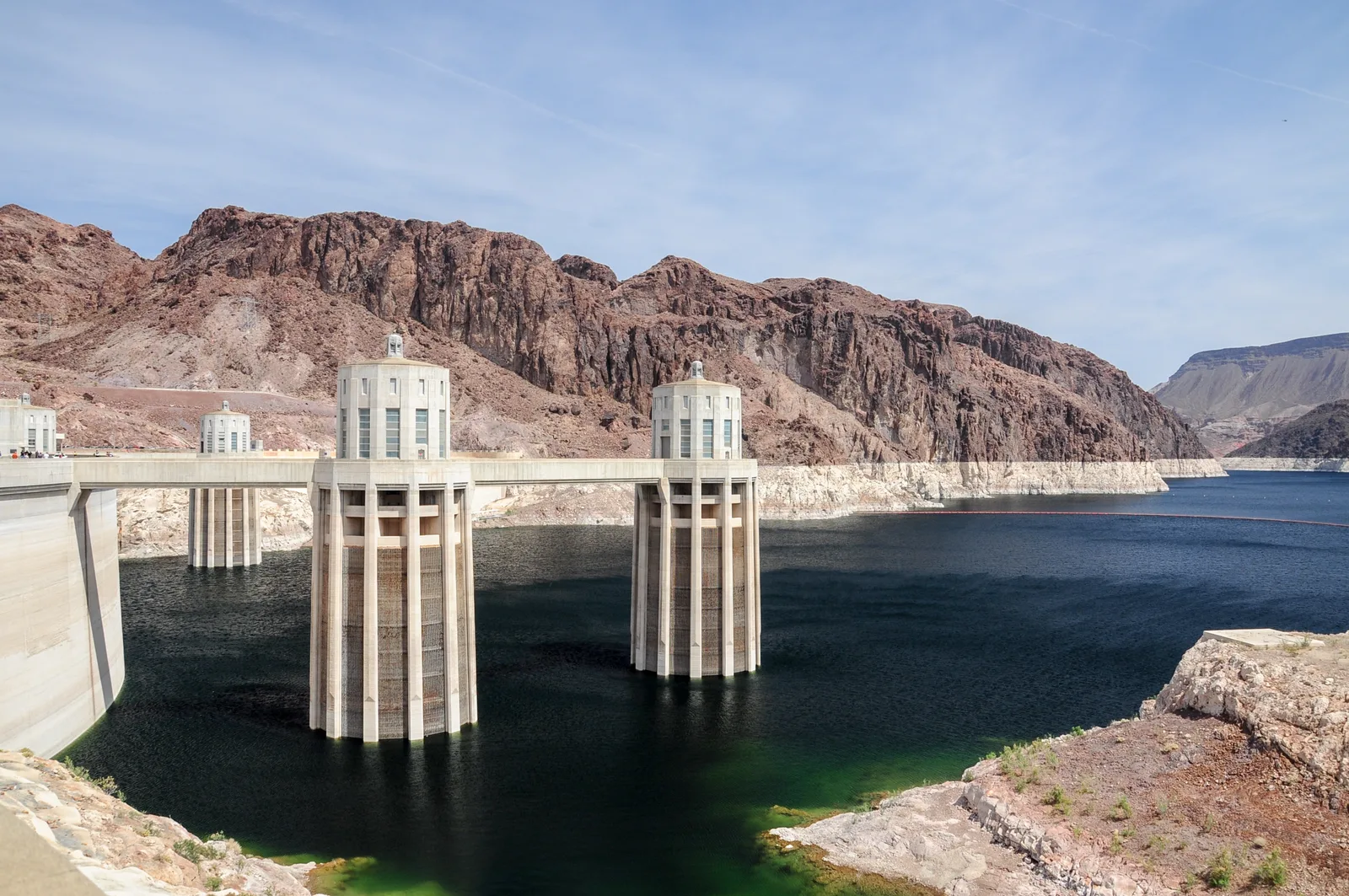 Lake Mead and Hoover Dam under a clear blue sky