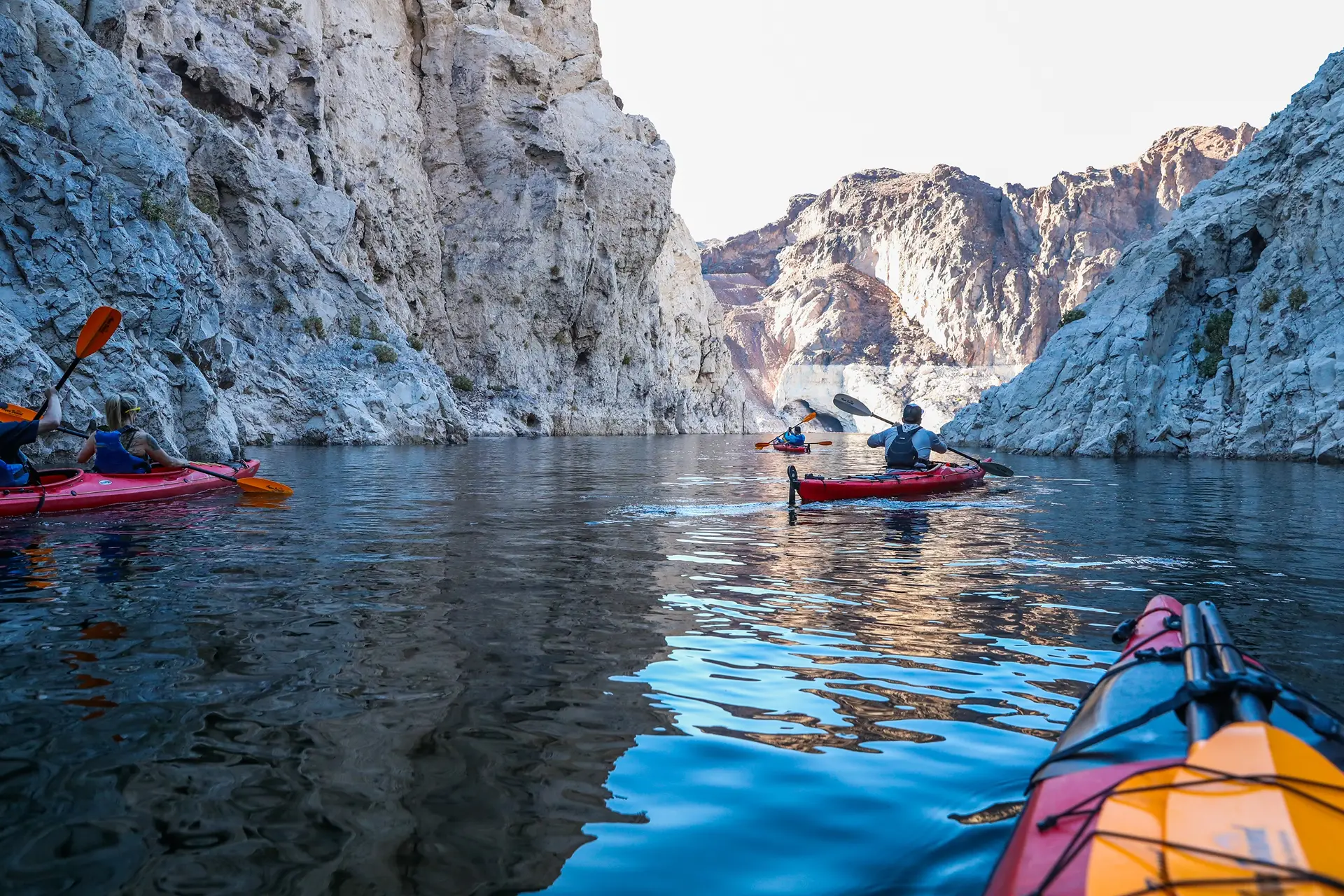 Kayakers paddling through the Kingman Wash slot canyons
