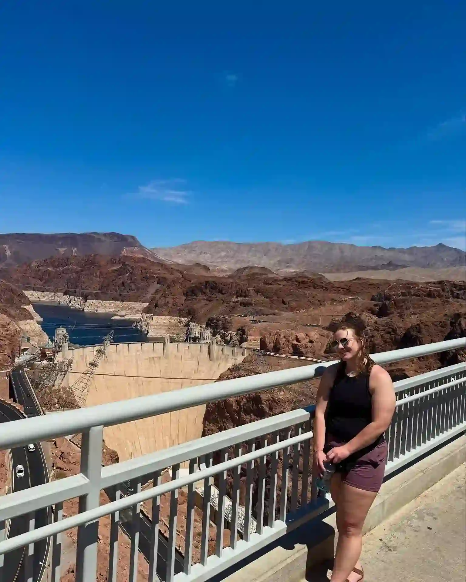 Guest overlooking Hoover Dam and Lake Mead from the bridge