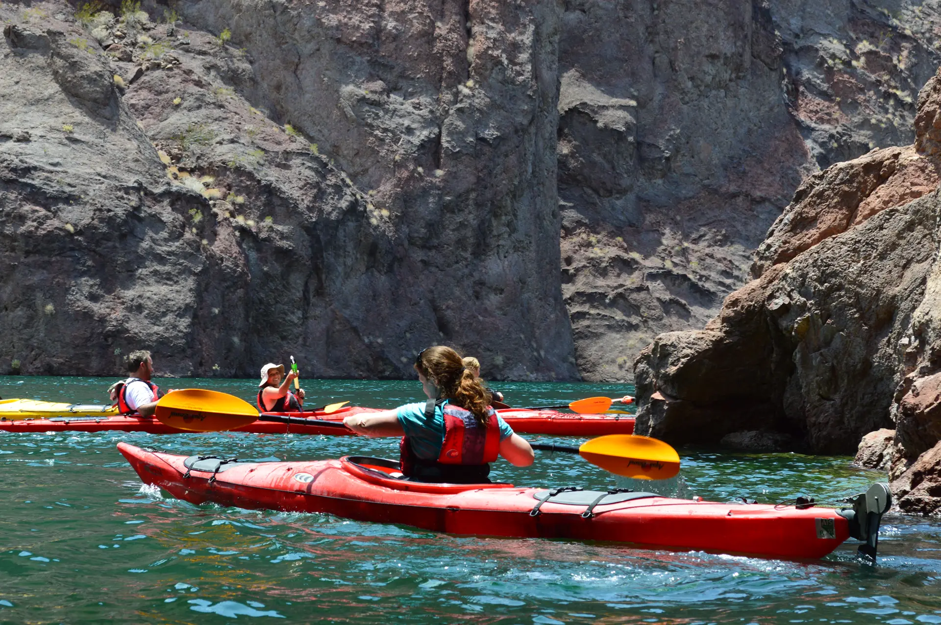 Kayakers exploring the Colorado River canyon